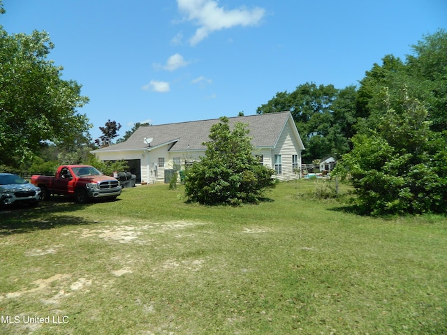 exterior space with a garage