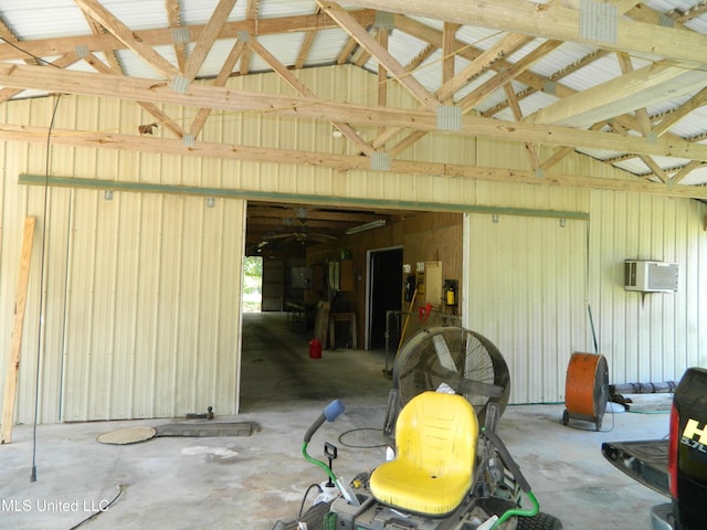 garage featuring an AC wall unit