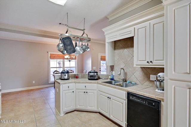 kitchen with tile counters, black dishwasher, sink, backsplash, and kitchen peninsula