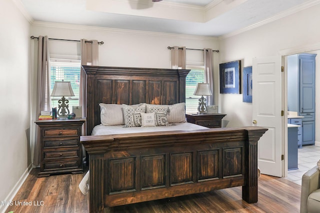 108 Kenbridge Ln, Madison, MS 39110 - bedroom with a tray ceiling, wood finished floors, crown molding, baseboards, and connected bathroom