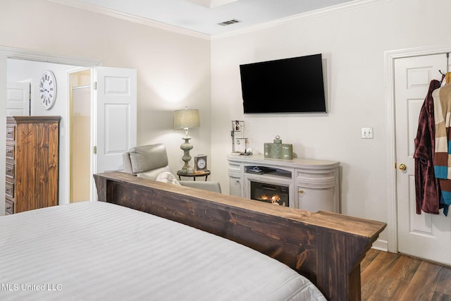 108 Kenbridge Ln, Madison, MS 39110 - bedroom featuring wood finished floors, crown molding, and a glass covered fireplace