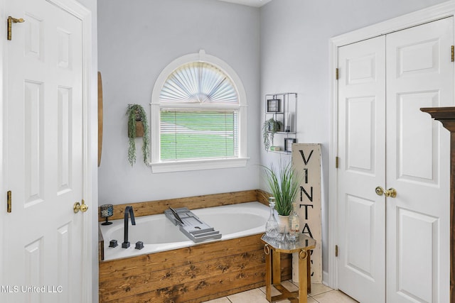 108 Kenbridge Ln, Madison, MS 39110 - bathroom with a bath, tile patterned flooring, and a closet