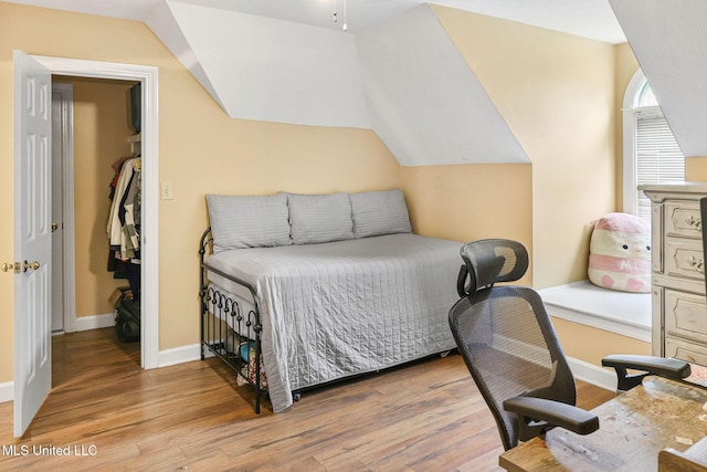 108 Kenbridge Ln, Madison, MS 39110 - bedroom with wood finished floors, baseboards, and vaulted ceiling