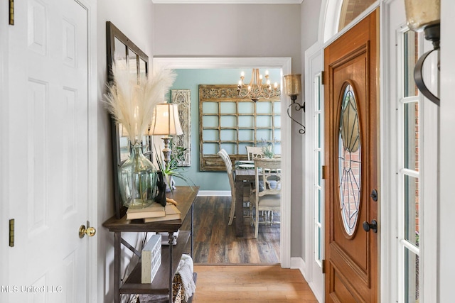 108 Kenbridge Ln, Madison, MS 39110 - foyer entrance with a chandelier, wood finished floors, and baseboards