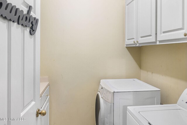 108 Kenbridge Ln, Madison, MS 39110 - laundry area with independent washer and dryer and cabinet space