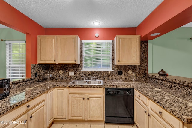 3005 Robalo Dr, Gautier, MS 39553 - kitchen with black appliances, light brown cabinets, a textured ceiling, a peninsula, and tile countertops