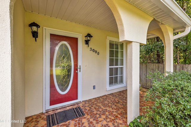 3005 Robalo Dr, Gautier, MS 39553 - doorway to property featuring stucco siding