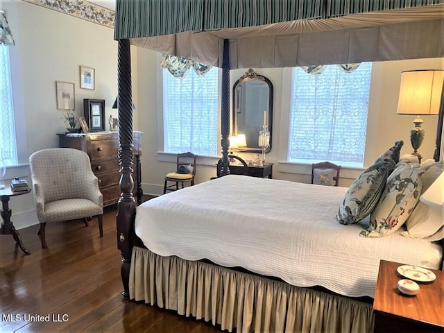 707 State St Unit 705, Natchez, MS 39120 - bedroom featuring wood-type flooring and baseboards