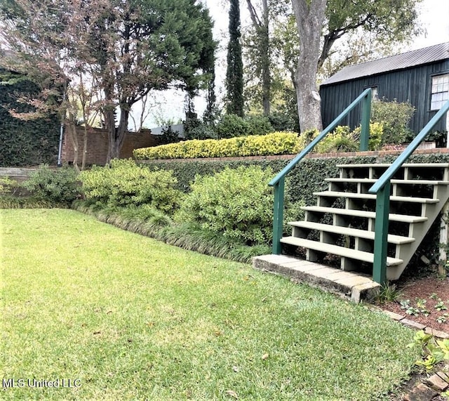 707 State St Unit 705, Natchez, MS 39120 - view of grassy yard featuring stairs