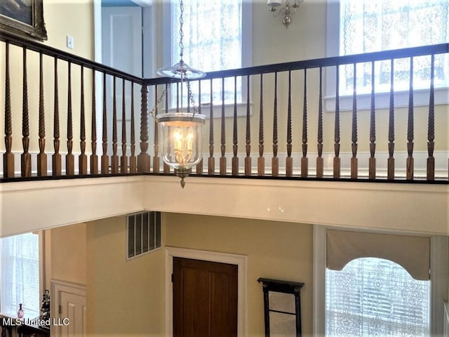 707 State St Unit 705, Natchez, MS 39120 - staircase with a chandelier