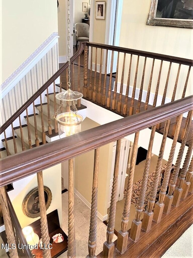 707 State St Unit 705, Natchez, MS 39120 - staircase with baseboards
