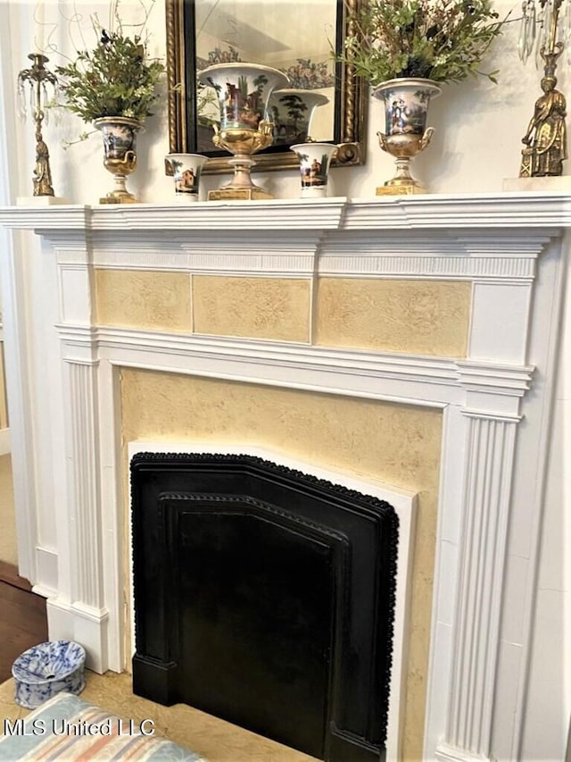 707 State St Unit 705, Natchez, MS 39120 - detailed view of a fireplace and wood finished floors