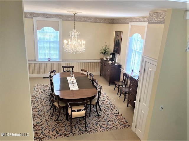 707 State St Unit 705, Natchez, MS 39120 - dining space featuring a chandelier and carpet floors