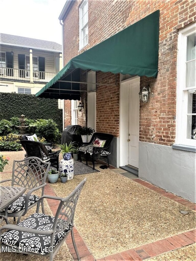 707 State St Unit 705, Natchez, MS 39120 - view of patio featuring outdoor dining area