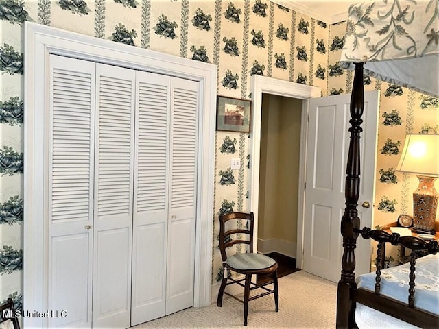 707 State St Unit 705, Natchez, MS 39120 - bedroom with a closet and wallpapered walls