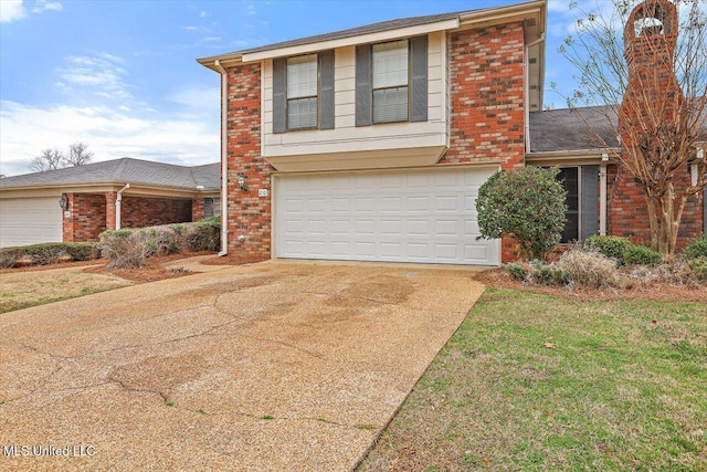 view of front of home featuring a garage and a front yard