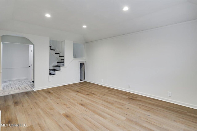 unfurnished room with light hardwood / wood-style flooring