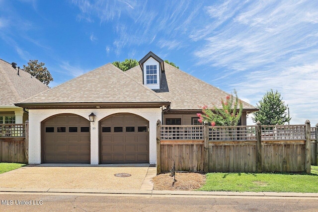 30 Charleston Cir, Brandon, MS 39047 - view of front of property featuring a garage, a shingled roof, driveway, and stucco siding