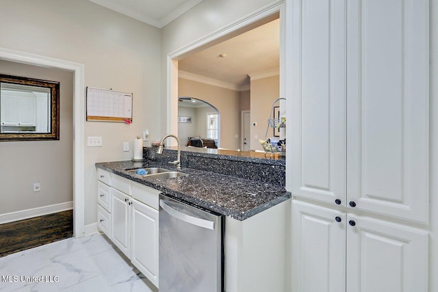 30 Charleston Cir, Brandon, MS 39047 - kitchen featuring dishwasher, light marble finish floors, white cabinets, dark stone counters, and arched walkways