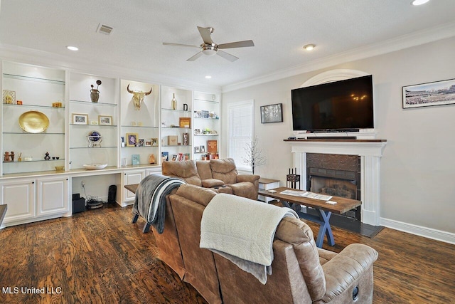 30 Charleston Cir, Brandon, MS 39047 - living room with ceiling fan, dark wood-style floors, a fireplace with flush hearth, crown molding, and recessed lighting