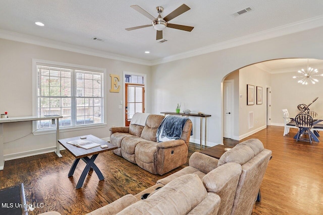 30 Charleston Cir, Brandon, MS 39047 - living room featuring arched walkways, wood finished floors, a ceiling fan, recessed lighting, and crown molding