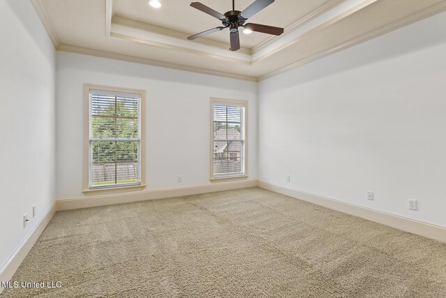 130 Camden Xing, Madison, MS 39110 - unfurnished room with a tray ceiling, ornamental molding, carpet, a ceiling fan, and baseboards