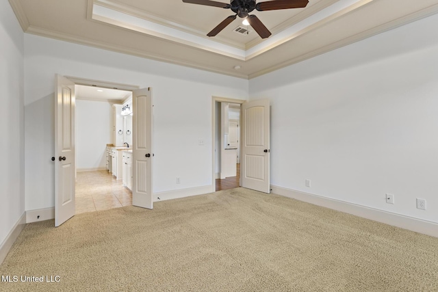 130 Camden Xing, Madison, MS 39110 - unfurnished bedroom featuring light colored carpet, crown molding, a raised ceiling, baseboards, and ceiling fan