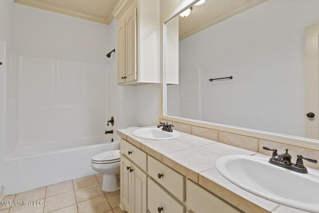 130 Camden Xing, Madison, MS 39110 - full bath with crown molding, toilet, double vanity, tile patterned flooring, and shower / bathtub combination