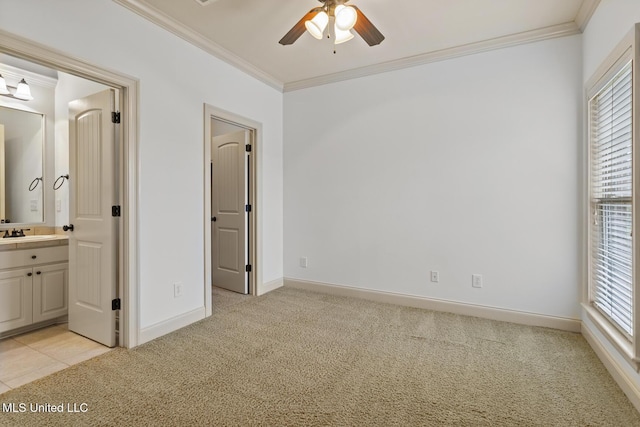 130 Camden Xing, Madison, MS 39110 - unfurnished bedroom with crown molding, a sink, light carpet, multiple windows, and baseboards
