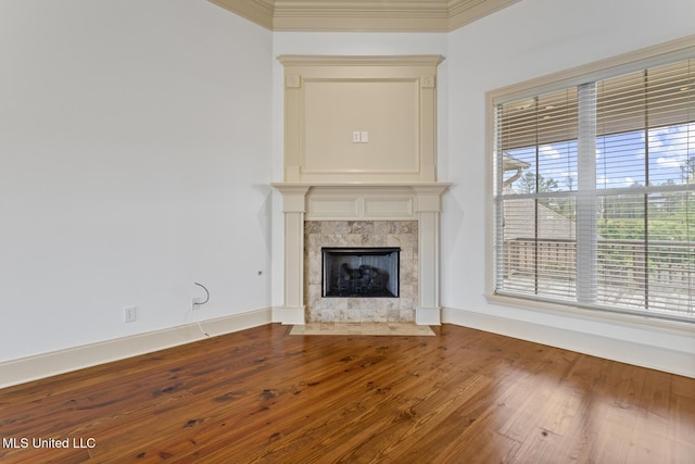 130 Camden Xing, Madison, MS 39110 - unfurnished living room featuring a fireplace, wood finished floors, ornamental molding, and baseboards