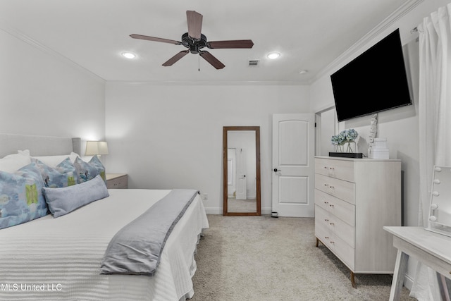 carpeted bedroom featuring ornamental molding and ceiling fan