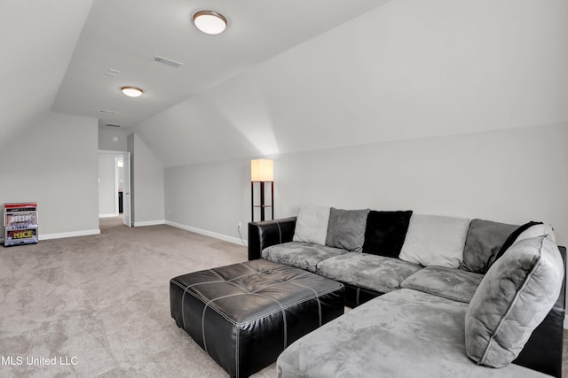 living room with lofted ceiling and light carpet