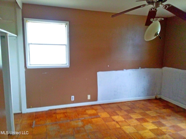 empty room featuring ceiling fan