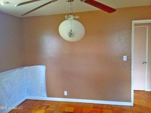 empty room with parquet flooring