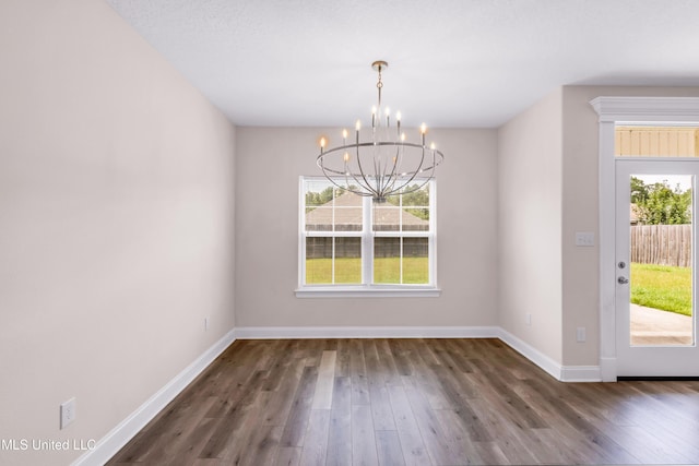 14864 Audubon Lake Blvd, Gulfport, MS 39503 - unfurnished dining area featuring a chandelier and wood finished floors