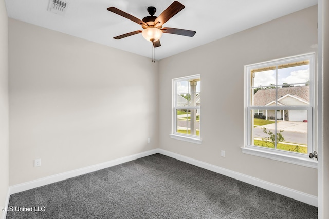 14864 Audubon Lake Blvd, Gulfport, MS 39503 - spare room with dark carpet and ceiling fan