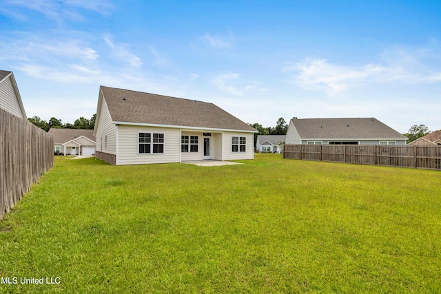 14864 Audubon Lake Blvd, Gulfport, MS 39503 - back of house featuring a patio and a shingled roof