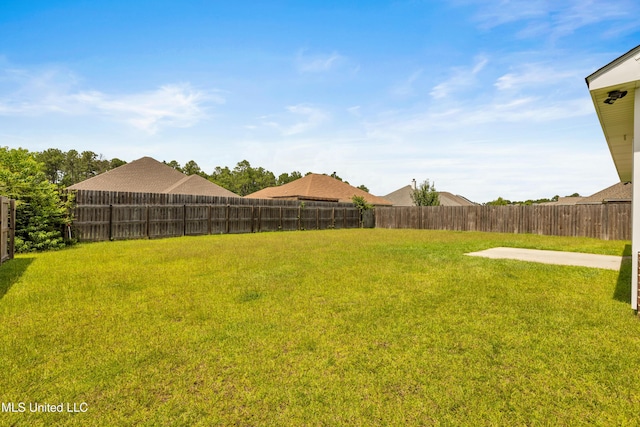 14864 Audubon Lake Blvd, Gulfport, MS 39503 - fenced backyard with a patio area
