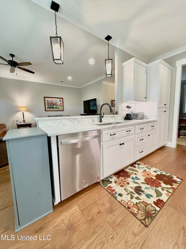 kitchen with sink, crown molding, hanging light fixtures, dishwasher, and white cabinets