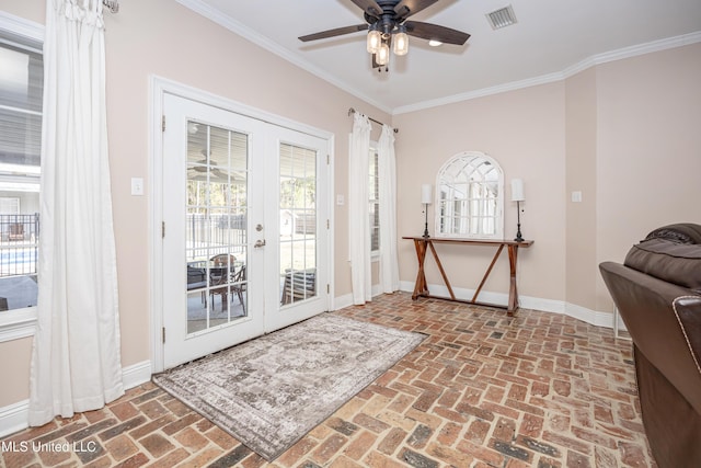 doorway to outside featuring ornamental molding, ceiling fan, and french doors