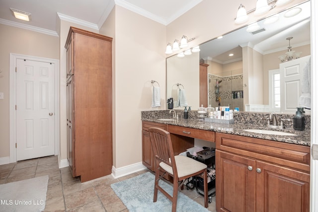 bathroom with ornamental molding, vanity, and a shower with shower door