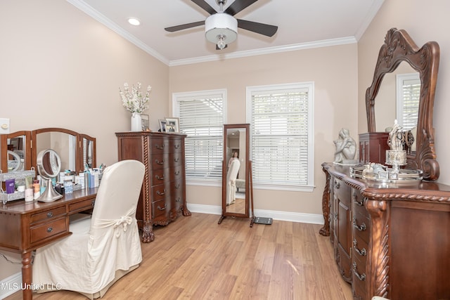 office space with light hardwood / wood-style floors, ceiling fan, and ornamental molding