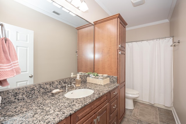 bathroom featuring toilet, vanity, tile patterned flooring, and crown molding