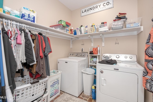 laundry room with separate washer and dryer