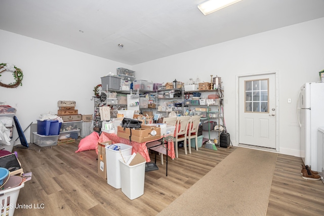 dining room with wood-type flooring