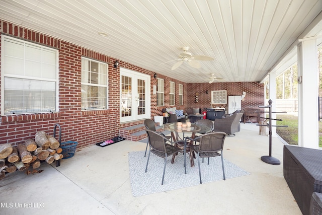 view of patio / terrace featuring ceiling fan, french doors, and an outdoor living space