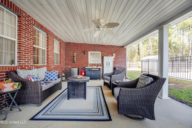 view of patio with ceiling fan and outdoor lounge area