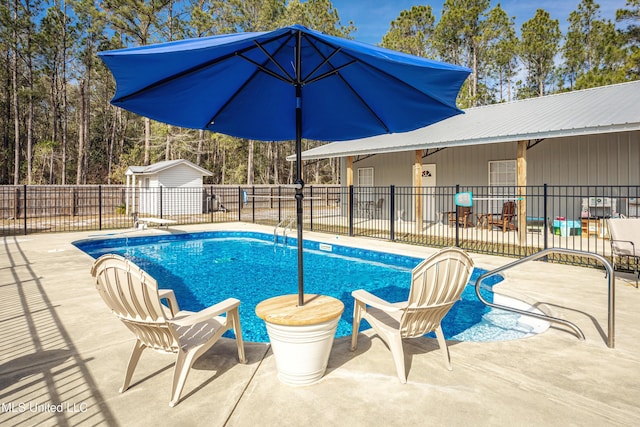 view of pool with a patio area