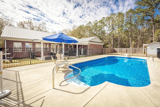 view of pool with a patio