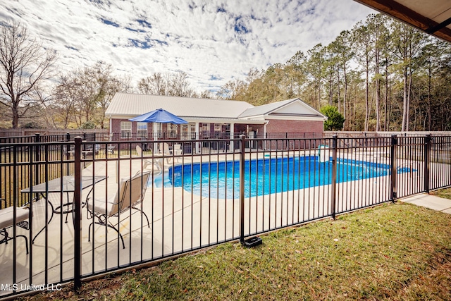 view of pool featuring a patio area